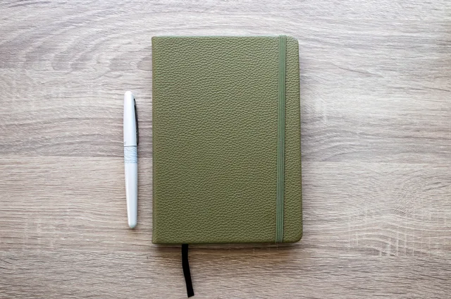notebook, pen, green, desk, office, business, write. Local grant costs: six checks, not prices