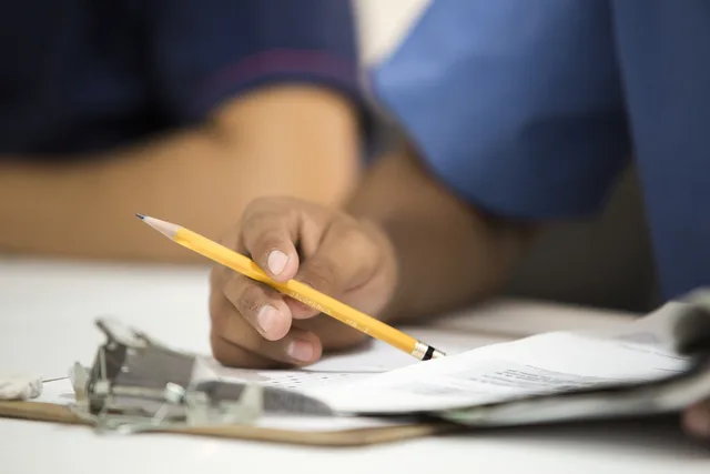 pencil, hand, desk, paperwork, test, examination, paperwork, paperwork, paperwork, paperwork, paperwork, examination. Local grant mistakes that turn a quick application into a lost season